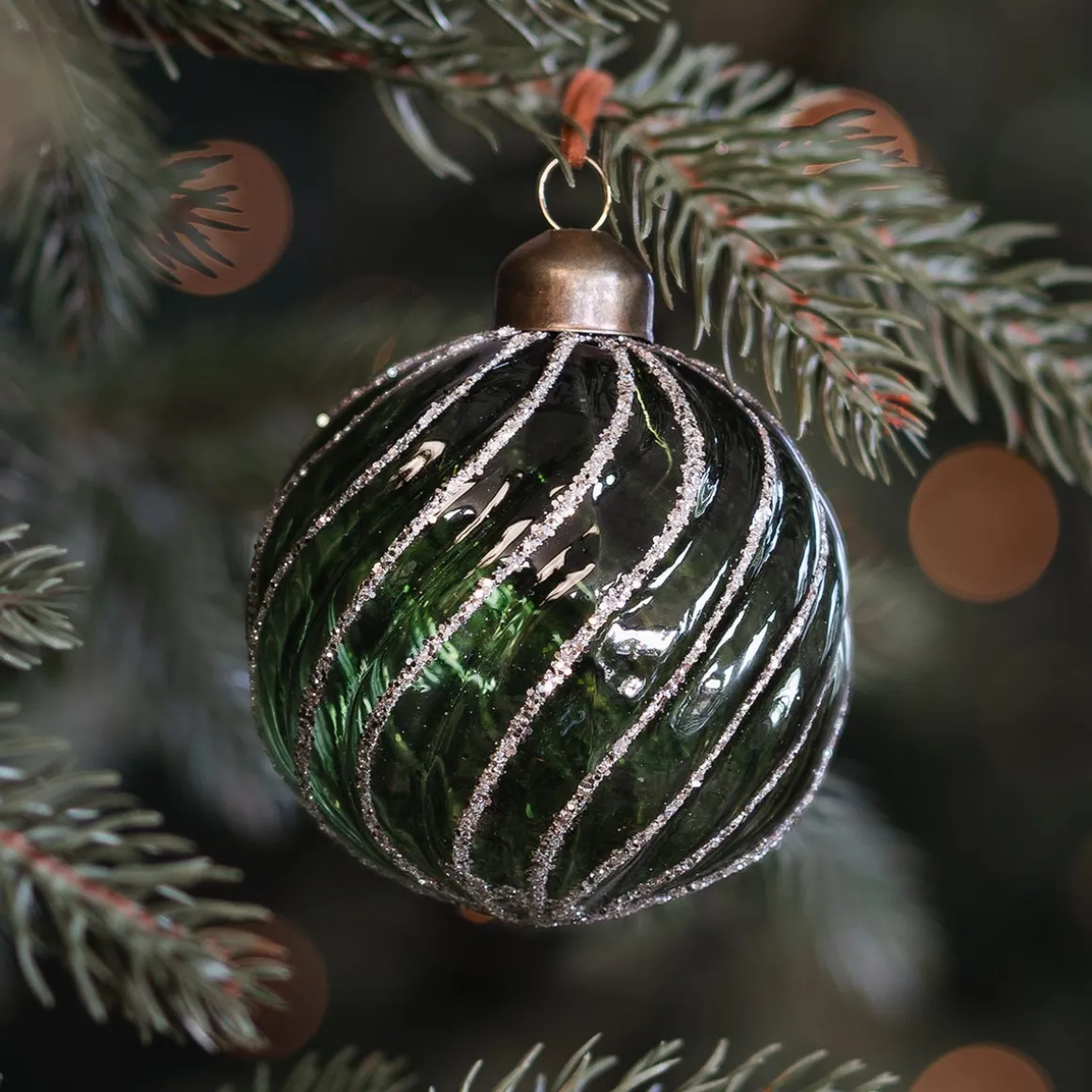 Fresh Green Christmas Bauble With Graceful Swirls
