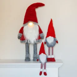 Funny Christmas Gnome With A Red Knitted Hat
