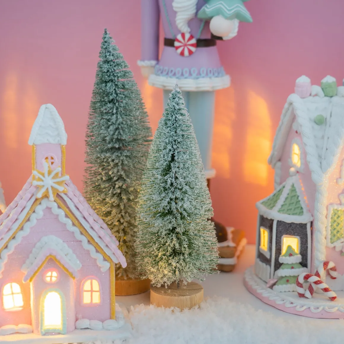 Green Christmas Tree On Wooden Base With Snow