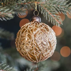 Warm Gold Christmas Bauble With Leaf Motif